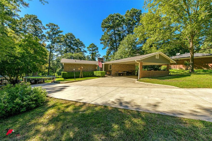 This peaceful home is set in a serene environment with a spacious living room that opens into the dining area, complete with a wood-burning fireplace & plenty of natural light. The functional kitchen includes a separate hall pantry, enhancing its practicality. The home features 3 bedrooms & 2 baths, including a remote master en-suite. Interior amenities are complemented by built-in cabinets, ceiling fans, a variety of flooring including carpet, ceramic tile, and hardwood under carpet, as well as a laundry room. Recently updated with a new roof in 2022, fresh exterior paint, and a new driveway, this home also has an oversized carport & additional storage space under the house. The pool is recently installed & removable upon request. Sold as-is, this property is ideal for buyers looking to make it their own. Conveniently near shopping, hospitals, schools, parks, museums, historical sites, golf & country clubs, fishing, dining, US 84, US 171, LA 175, & I-49 + 30 mins to Toledo Bend.