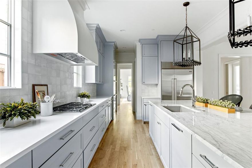 Experience this new construction transitional single-family residence brimming with high-end finishes and elegant touches by an Interior Designer with a sophisticated eye for detail. The spacious 1st floor boasts a welcoming foyer, a sophisticated dining room with wainscoting, a dedicated study with built-ins, guest suite, & a well functioning kitchen complete with Wolf and Subzero appliances. The kitchen opens to your breakfast nook and living room overlooking the backyard through a large wall of sliding glass doors. Four sizable bedrooms are located on the second floor, including the spacious primary suite with spa-like bath and ensuite baths for all secondary bedrooms. Second floor amenities include a convenient second staircase, centrally located utility room, game room with vaulted ceilings & a bonus desk area. Located directly across from a luscious park with the privacy of a corner lot this home combines the very best of design and location - this is your opportunity!