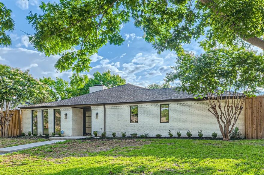 Welcome to 16212 Spring Creek Road, a beautifully single-story home nestled in the desirable Highlands North neighborhood of Dallas. This 4 bedroom, 3 bathroom offers a thoughtfully designed living space, blending modern upgrades with timeless charm. Upon entering, you're greeted by a spacious foyer that leads to an expansive home office on one side and an open concept living and dining area on the other. The living room features elevated ceilings, a wall of windows that flood the space with natural light. The heart of the home is the modern kitchen, boasting ample storage, a large walk-in pantry, quartz countertops. The kitchens eat-in area is surrounded by windows, creating a bright and inviting space for casual meals. The primary suite serves as a private retreat, complete with a fireplace, custom closet system, and a luxurious en-suite bathroom featuring dual vanities, a garden tub, and a separate shower. One of the three secondary bedrooms includes its own en-suite bath, providing comfort and privacy for guests. Come experience the perfect blend of comfort, style, and functionality—a true gem in a sought-after Dallas neighborhood.