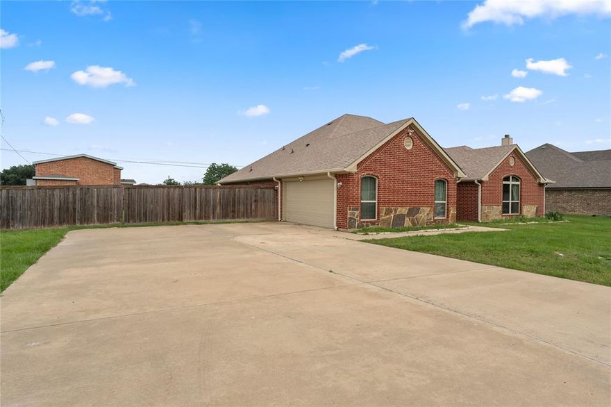 Welcome to this beautifully designed single-story home that perfectly blends comfort, functionality, and elegance. Situated on an expansive double lot, this 4-bedroom, 2-bathroom residence offers an exceptional layout and an inviting atmosphere, making it ideal for families, entertaining guests, or simply enjoying peaceful everyday living. As you enter the home, you're greeted by a spacious open-concept floor plan that seamlessly connects the main living areas. The expansive living room flows effortlessly into the dining area and kitchen, creating a bright and airy space filled with natural light. Gorgeous tile flooring extends throughout the home, adding a cohesive and stylish touch while also being easy to maintain.The heart of the home is the beautifully appointed kitchen, featuring gleaming granite countertops, custom cabinetry, and ample counter space that will inspire your inner chef. A thoughtfully designed built-in shelving unit adds both function and charm, perfect for displaying books, décor, or collectibles.The primary bedroom offers a peaceful retreat with generous dimensions and a well-designed layout. The attached ensuite bathroom features modern fixtures and finishes, ensuring both comfort and privacy.
Step outside to enjoy the benefits of a double lot is a rare find that offers expanded outdoor living opportunities. Whether you envision a garden, play area, or future pool, the possibilities are endless. The yard is perfect for weekend barbecues, outdoor entertaining, or simply relaxing in your own private space. Additional features include a spacious laundry area, energy-efficient lighting, and a layout that supports both everyday convenience and effortless entertaining. This home truly offers the best of both worlds — a modern, open design paired with timeless finishes and the rare luxury of a large lot. Don’t miss the opportunity to make this exceptional property your next home.