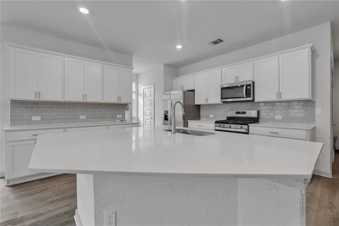 Photo of 10633 DEFENDER Trail, Austin, TX 78754 (MLS # 21312443)
