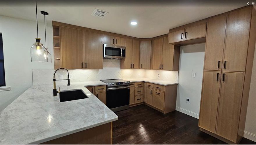 Welcome to this fully remodeled home in Gainesville, thoughtfully updated for comfort, style, and everyday living. The home features a new roof, new HVAC system, and a brand-new gate, offering peace of mind along with fresh, modern updates throughout.

Inside, you’ll find an open layout with updated flooring, modern fixtures, and plenty of natural light. The kitchen is both functional and inviting, featuring updated countertops, and cabinetry great for daily living and entertaining. Property features brand-new cedar fencing complemented by an iron driveway gate.

The bedrooms are comfortably sized, and the bathrooms have been refreshed with clean, contemporary finishes. Out back, the spacious yard provides plenty of room to relax, host gatherings, or make it your own.

Conveniently located near highways, shopping, dining, and local amenities, this move-in-ready home is a great opportunity for anyone looking for a well-updated property in a convenient location.