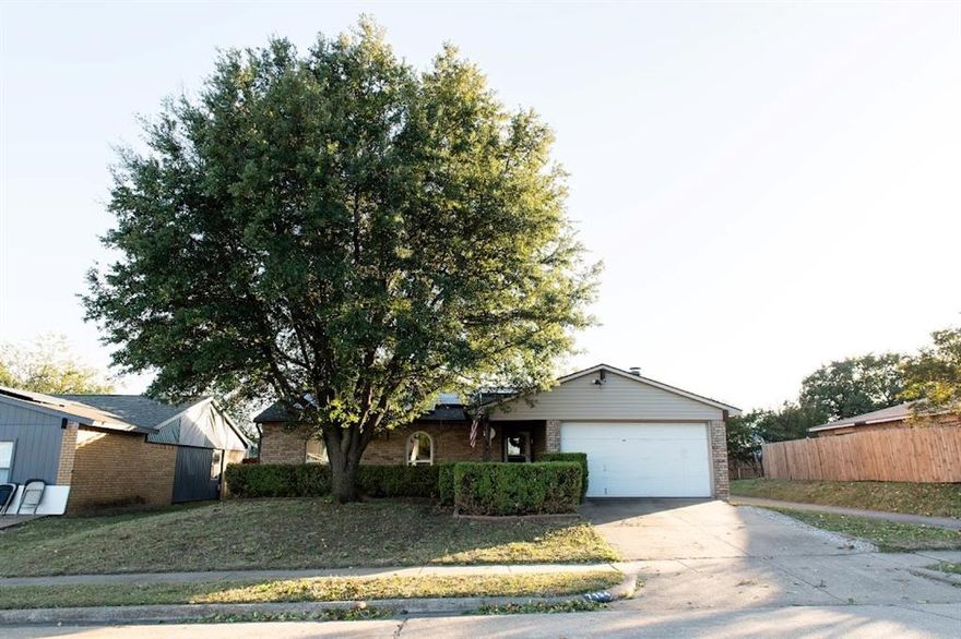 Very Special Home with privacy shrubs and a walkway into the home, close to DFW and major Freeways.  New energy-efficient windows were installed in June 2025 throughout the home, and laminated Flooring Was Installed. A new composition roof was replaced in March 2025, and Solar panels for the full roof. Electricity is very low—living room with fireplace, open to the kitchen and laundry. Total kitchen remodel with new stainless steel vent-a-hood and cabinets. The garage is large enough for one car and storage. Ceiling Fans in all rooms. Large backyard with alley access. Storage shed in the backyard. Security system for the front and back of the house. The Home is completely move-in ready and ready for a new family. Schedule your appointment today. Seller is providing 3% Lenders' Incentive toward Buy-down interest rate or closing cost. Ask the listing agent for more details. Buyer and Buyer's agent to verify all information. Property offers easy access to I-20, Hwy. 67 and Spur 408, connecting to DFW entertainment. Public transportation is available blocks away. Close to Joe Pool Lake State Park and shopping.