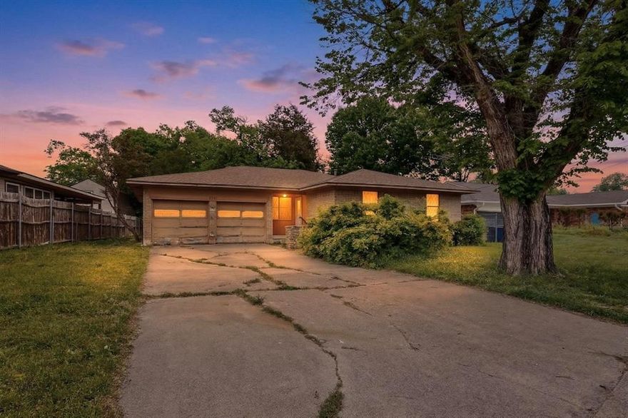 Unlimited possibilities await in a quiet, established neighborhood with this charming ranch home, situated on a .32 acre creek lot and loaded with potential! Double door attached garage, drive-up appeal awaiting polish. Inside features a very livable floorplan, with huge living-dining-kitchen combo boasting brick fireplace. Kitchen with eat-in bar, funky original vinyl flooring, vintage appliances, gas stove, ample cabinetry and more. Hardwoods MAY be under carpet. Second living area provides flow and versatility. Large bedrooms. Backyard goes on-and-on down towards the creek bed, could be a marvelous, tranquil retreat!