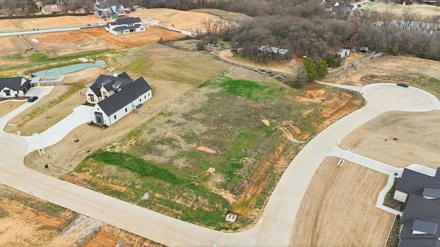 Beautiful 1.132 acre residential lot ready for your custom dream home. Bring your own builder and create a space that fits your lifestyle from the ground up. Located on a corner within a quiet bedroom community made up of only 12 homesites, this property offers a rare mix of privacy and flexibility.

Situated in the county with no HOA and no city taxes, you have the freedom to design and build without restrictive oversight while still enjoying a well planned setting. A minimum of 2800 square feet of living space helps maintain strong property values and a cohesive feel throughout the neighborhood.

Enjoy the peaceful atmosphere of country living with open skies and room to spread out, all while staying conveniently close to shopping, dining, and major commuting routes. Located in highly sought after Argyle ISD, this lot is an ideal opportunity to build a home tailored to your needs in a location that continues to grow in demand.