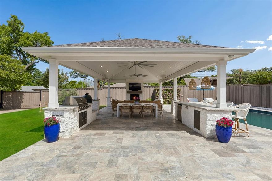 Situated on a beautifully manicured .399-acre lot, this charming and fully updated Northwood Hills residence offers the perfect blend of timeless curb appeal and modern luxury with a NEW ROOF to be installed before closing. Inside, a light-filled open floorplan is designed for effortless entertaining, featuring a reimagined chef's kitchen with a generous island and stainless appliances that flows seamlessly into the spacious living area with a gas stone fireplace, thoughtfully designed built ins and a wet bar. The main level also hosts a large dining room in addition to the breakfast area, and a versatile study with French doors that could easily be used as a playroom or second living room. A generous primary suite with three closets and a spa like ensuite bath, plus a convenient first floor guest room with full bath and a half bath convenient to the pool round out the main level, while the upper level features a spacious game room and three additional bedrooms, one which is en-suite with updated baths. The crown jewel of the property is the extraordinary resort style outdoor living area, envisioned for year round entertaining; an expansive covered patio with Silver VP Travertine pavers, two islands featuring a built in Blaze gas grill and fridge, Serena & Lily designer pendants, a striking fireplace, industrial-style fans, and two Infratech ceiling mount heaters overlooks a sparkling resurfaced pool and lush lawn.  The boundless backyard offers exceptional space for entertaining, outdoor dining, watching the big game and enjoying the Texas sunshine in complete comfort. Ideally located within RISD boundaries near premier shopping, dining, and top private schools, 7439 Stonecrest Drive presents a rare opportunity for an elevated lifestyle experience in one of Dallas' most coveted neighborhoods.