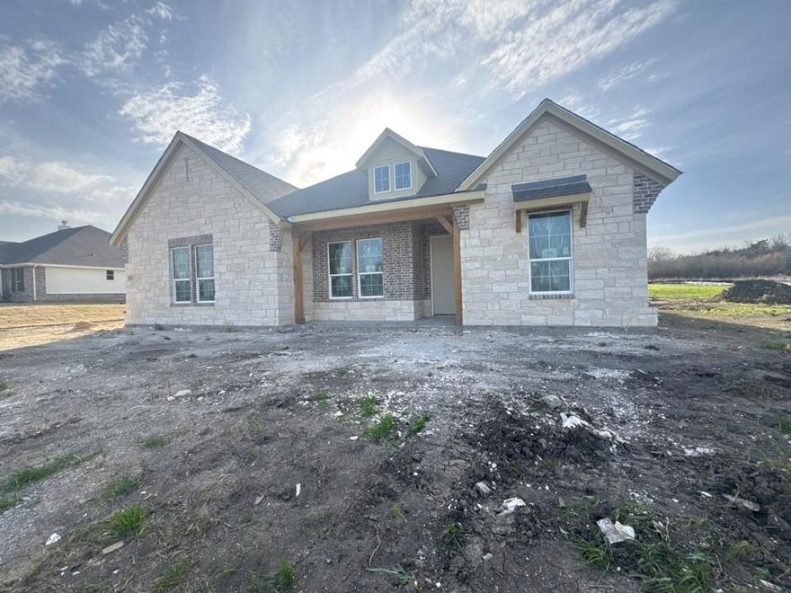 Estimated June 2026 completion! Ask us about our Trade In Trade Up program, we can buy your home!: Step into the Bluebonnet by Riverside Homebuilders and embrace a lifestyle of comfort and functionality. With 4 bedrooms and 3 bathrooms sprawled over 2,686 square feet, this single-story haven offers ample space for every member of the family. As you enter through the inviting porch, the airy foyer sets the tone for the home's open layout. To the left, a flex room awaits, beckoning to be transformed into your ideal space—whether you envision a home office, gym or hobby room. Continue through the foyer to discover the heart of the home—a luminous dining room bathed in natural light. Beyond lies the main living area, a seamless fusion of the expansive kitchen, cozy family room featuring a fireplace and a charming nook adorned with picturesque windows. On the right wing of the home, privacy awaits with three traditional bedrooms and a breathtaking owner's suite. The owner's retreat boasts a spacious walk-in closet and a spa-like bathroom, offering a sanctuary for relaxation. Convenience is paramount with the laundry situated just off the bedrooms, accompanied by a mud bench near the garage entrance. To embrace the beautiful DFW weather without having to leave your home, step outside to the generous covered patio—where endless possibilities for outdoor enjoyment await. With its thoughtful design and inviting atmosphere, the Bluebonnet embodies the epitome of charming Texas living for all families alike.