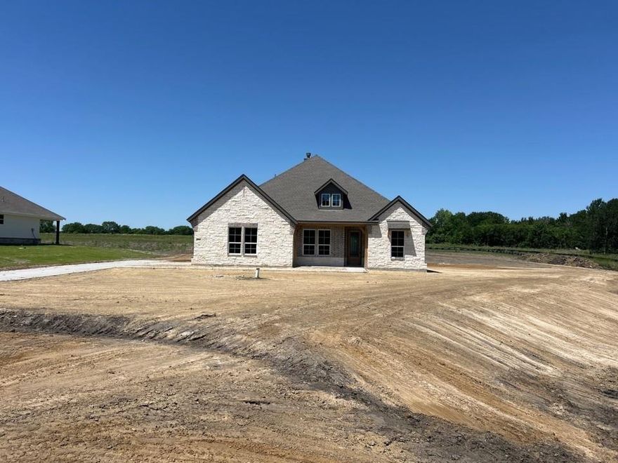 Estimated June 2026 completion! Ask us about our Trade In Trade Up program, we can buy your home!: Step into the Bluebonnet by Riverside Homebuilders and embrace a lifestyle of comfort and functionality. With 4 bedrooms and 3 bathrooms sprawled over 2,686 square feet, this single-story haven offers ample space for every member of the family. As you enter through the inviting porch, the airy foyer sets the tone for the home's open layout. To the left, a flex room awaits, beckoning to be transformed into your ideal space—whether you envision a home office, gym or hobby room. Continue through the foyer to discover the heart of the home—a luminous dining room bathed in natural light. Beyond lies the main living area, a seamless fusion of the expansive kitchen, cozy family room featuring a fireplace and a charming nook adorned with picturesque windows. On the right wing of the home, privacy awaits with three traditional bedrooms and a breathtaking owner's suite. The owner's retreat boasts a spacious walk-in closet and a spa-like bathroom, offering a sanctuary for relaxation. Convenience is paramount with the laundry situated just off the bedrooms, accompanied by a mud bench near the garage entrance. To embrace the beautiful DFW weather without having to leave your home, step outside to the generous covered patio—where endless possibilities for outdoor enjoyment await. With its thoughtful design and inviting atmosphere, the Bluebonnet embodies the epitome of charming Texas living for all families alike.