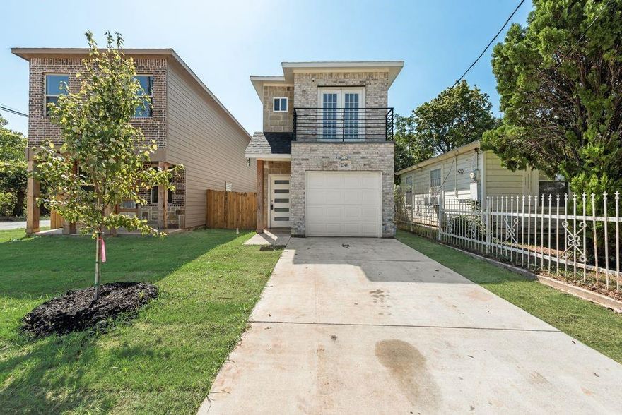 Welcome to 2346 Scott St, a beautifully designed and brand-new home nestled in the conveniently located in Lincoln Manor of Dallas, TX. This modern two-story residence offers the perfect blend of style and functionality with 3 spacious bedrooms and 2.5 well-appointed bathrooms. The exterior boasts a striking combination of light brick and modern architectural lines, complete with a charming second-story balcony accessible from the upper level. A convenient 1-car garage provides secure parking and additional storage. Appliances included at closing: range, built-in microwave, dishwasher, refrigerator, washer, and dryer. This property is Eligible for Community Reinvestment Act (CRA) Loan.