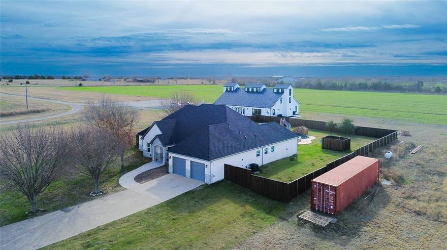 This exceptional property offers a total of 5.02 acres, subdivided into four separate lots, providing a rare opportunity for multiple uses, future development, or income-producing strategies. The offering includes the entire property, with flexibility to purchase all together or separately, subject to acceptable terms. Located on Lot 3 with 1.5 acres is a custom-built completed in 2023, designed with 4 bedrooms, 3 full bathrooms, a dedicated home office, open-concept kitchen, living area, and formal dining space. The home offers a functional layout with quality finishes, ideal for both everyday living and entertaining. The exterior features a resort-style swimming pool and a spectacular backyard, creating a private oasis perfect for gatherings, relaxation, or hosting events. The surrounding acreage provides additional privacy and potential for expansion or enhancement. Situated on Lot 2 is a 3,500 square foot event center, offering excellent potential for business operations, private events, rentals, or other commercial uses. This structure significantly enhances the versatility and value of the property. Both the residential home and the event center are separate structures, each equipped with its own electric meter and water connection, allowing independent operation and flexibility for future use or ownership separation. The two structures share a common septic system, efficiently servicing both buildings. With four subdivided lots, substantial acreage, residential luxury, and commercial potential, this property presents a truly unique opportunity in the growing Greenville area. Ideal for owner-users, investors, developers, or entrepreneurs seeking a versatile estate with multiple revenue possibilities. Please note that the residence is located on Lot 3, which consists of approximately 1.5 acres and is the portion being highlighted in this listing. However, the total property spans 5.002 acres, which includes Lots 1, 2, 3, and 4 as part of the overall offering.