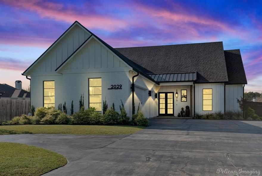 **Luxurious Elegance in South Shreveport**
Discover a sophisticated blend of modern luxury and timeless charm in this exquisite 4-bedroom, 3.5-bath estate, nestled in one of Shreveport's premier communities. Designed for both grand entertaining and intimate gatherings, this opulent residence offers an unparalleled living experience. A spacious 3-car garage provides convenient parking and storage solutions for the discerning homeowner.
**Impeccable Interior Design and Comfort**
Enter through the foyer into a world of refined elegance. A spacious open-plan layout seamlessly connects the main living areas, featuring soaring ceilings and abundant natural light. The heart of the home, a gourmet kitchen, is equipped with top-of-the-line stainless steel appliances, custom cabinetry, and an expansive island, catering to both casual meals and formal dining. The adjoining dining room is perfect for hosting elegant dinner parties.
Retreat to the luxurious primary suite, a serene sanctuary with a spa-inspired en-suite bathroom that includes a deep soaking tub, a separate glass-enclosed shower, and dual vanities. Three additional bedrooms offer comfort and versatility, each thoughtfully designed with high-end finishes and ample closet space.
Outside, there is a large screened-in back patio that has a fireplace that goes through to the living room and a fully fenced-in yard. This property has so much to offer from being in a gated community to the close proximity of everything South Shreveport has to offer.