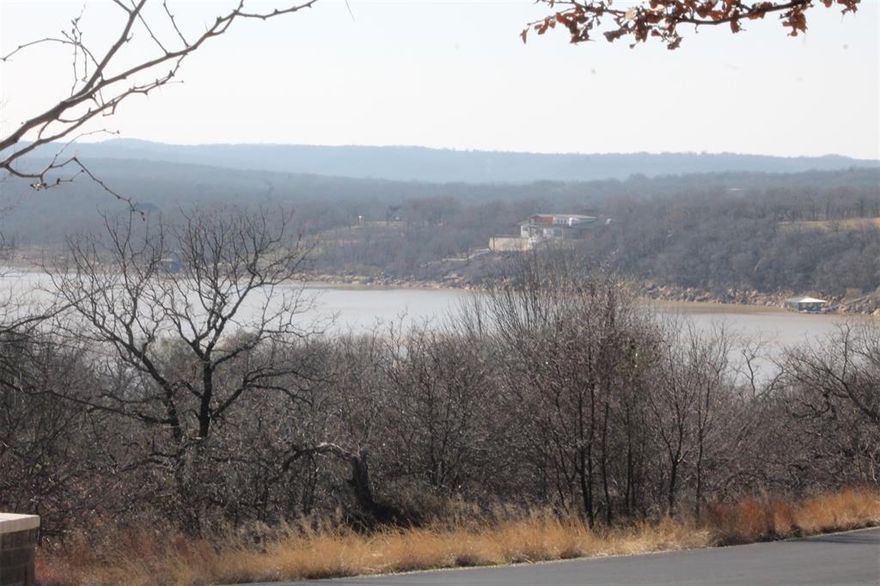 Interior lot in beautiful North Star Pointe with views of Lake Bridgeport. This is an upscale gated community of North Star Pointe. Lake Bridgeport, a 12,000 acre lake that is a first choice of boaters, skiers, fishermen, and other water sports. The community features its own private water system, paved streets, underground utilities, on one plus size acre lots. The community pool, boat ramp, day slips and pickle court at North Star Pointe are available to all owners. Come enjoy the lake.