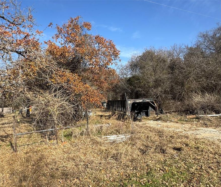 This is two acres, with two parcels. Some clearing and some dilapidated structures would need to be dealt with, but you have two acres to make your own on the corner.  The property is an estate where the will has been probated and is ready to be sold. It will not be subdivided.  There are nice trees throughout the property.