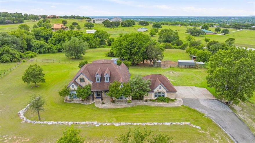Located inside the prestigious gated community of Bentwater on Lake Granbury, this extensively remodeled 5 acre estate offers a rare blend of refined living, acreage, and equestrian functionality. With approximately 4,000 square feet, the home features 5 bedrooms, 4 and a half bath, plus a private office or additional living space, and an upstairs game room or media room, creating a flexible layout designed for both everyday comfort and elevated entertaining.

Recent improvements include new water lines, new flooring, updated finishes, and thoughtful enhancements throughout, giving the property a fresh, polished feel while preserving the warmth and livability buyers want in a true Texas estate. The spacious floor plan offers generous living areas, a well-appointed kitchen, and room for family, guests, work, and recreation.

Set on 5 usable acres, the property provides the space and versatility for horses, outdoor living, and a private acreage lifestyle, all within one of Granbury’s most sought after lake communities. Bentwater offers gated privacy, a beautiful residential setting, and access to Lake Granbury, while still being just minutes from town, shopping, dining, and historic downtown Granbury.

A rare opportunity to own a remodeled acreage estate with equestrian potential in a gated Lake Granbury community.