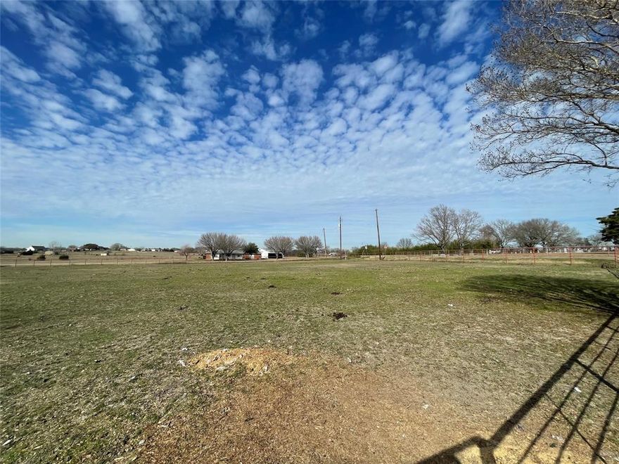 Amazing opportunity to live out in the country!! This LARGE 2- story, 2,612 sq ft home has 4 bedroom, 2.5 bath sits on 5 acre corner lot with some breathtaking country views and within minutes from the city. The property includes a barn with 4 stalls and is fenced with pipe fencing and cross-fenced to house your livestock. The property will require full rehab. Don't miss out on a chance to get-away from the busy city life and create your own country lifestyle. Whether you are looking to start fresh or invest in land outside of the city limits, this lot offers privacy, space, and possibilities.