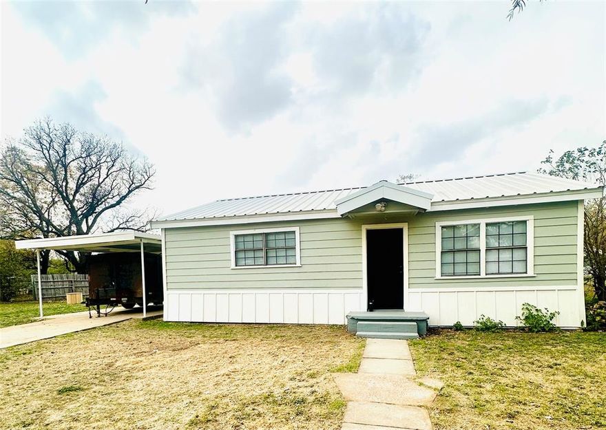 Welcome to this beautifully remodeled 3-bedroom, 2-bath home in Merkel, Texas. Step inside to find fresh updates throughout, including new flooring, new interior paint, and stylish tile surrounds in both bathrooms. The kitchen offers a modern touch with sleek black cabinets, floating shelves, and included appliances, making it move-in ready from day one. The home will have mini splits installed before closing! Need help with closing cost, this seller is motivated and ready to help! 

Enjoy the spacious layout featuring a large living and dining area, perfect for gathering or relaxing. Outside, the durable metal roof adds the finishing touch to this thoughtfully updated home. This property blends comfort, style, and convenience, ready for its next owner to enjoy.