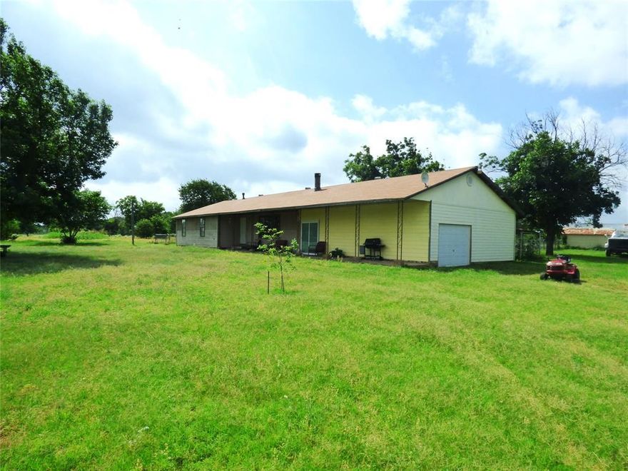 Here's a nice, secluded 3 bedroom 2 bath home at the end of a short county road in Ranger Tx! This 1900 sq ft home, per CAD, is situated on 2.5 acres and is located just east of Ranger High School, at the south end of CR 472. One of the secondary bedrooms needs flooring and painting, but other than that, this home is move-in ready. The kitchen is nicely done, and opens to the dining area, which opens to the spacious living room. The single car attached garage is connected to the kitchen by an enclosed breezeway that provides additional storage space. Both front and back yards are plenty big and have some beautiful, mature shade trees. There's also a shop or garage building located in the back, just outside of the yard fence. This property offers lots of room and lots of possibilities. Come take a look at this one!