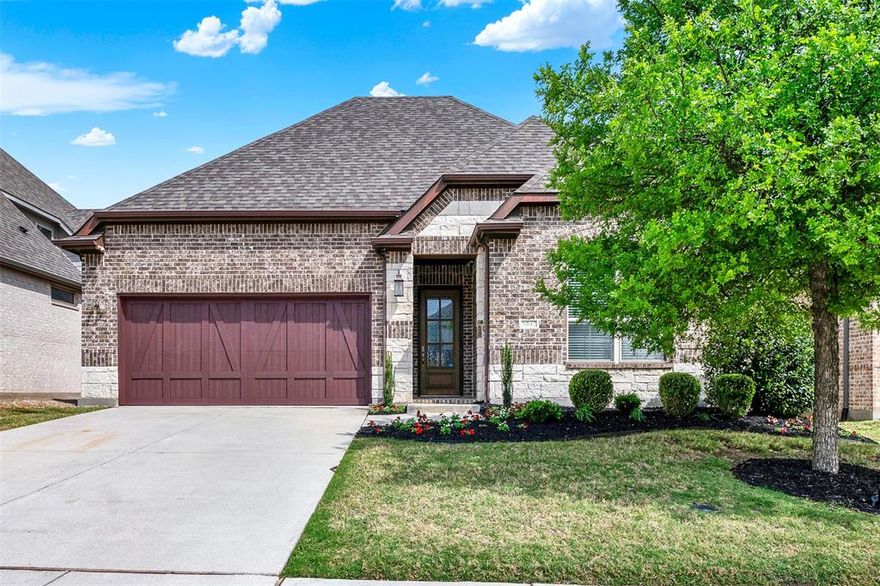 Experience Luxury Living In Mustang Lakes With This Stunning 4-Bedroom, 3-Bath Single-Story Home In Prosper, TX, Located In Highly Sought-After Prosper ISD And Zoned To Walnut Grove High School, Featuring A Move-In Ready Open-Concept Floor Plan With Engineered Wood Flooring, Crown Molding, Custom Trim Work, And Designer Shiplap Accents Throughout; The Gourmet Kitchen Showcases A Large Quartz Island, White Cabinetry With Upgraded Hardware, Double Ovens, Gas Cooktop, Under-Cabinet Lighting, And A Premium Bosch Dishwasher, While The Spacious Living Room With Gas Fireplace Flows Seamlessly Into The Dining Area And Backyard For The Ultimate Indoor-Outdoor Living Experience; A Private Home Office With French Doors Offers Flexible Space, While The Primary Suite Retreat Features A Bay Window With Backyard Views And A Spa-Inspired Bathroom With Quartz Countertops, Dual Vanities, And A Large Walk-In Shower; A Thoughtfully Designed Layout Includes A Separate Guest Or Multigenerational Suite With Private Bath And Barn Door Entry; Enjoy Resort-Style Amenities Including A Clubhouse, Fitness Center, Multiple Pools, Parks, And Walking Trails, Plus HOA-Maintained Front Yard Landscaping For Low-Maintenance Living, All Conveniently Located Near Shopping, Dining, And Major Highways—Offering The Perfect Blend Of North Dallas Luxury, Comfort, And Convenience.
