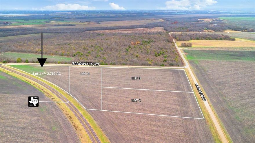 Spacious 2.719-acre corner lot in Ennis with double road frontage along FM 985 and Colvin Rd. With access on two sides, this tract offers excellent versatility for residential use, agricultural purposes, or future development. The land is level, unrestricted, outside the floodplain, and currently carries an ag exemption for low holding costs. Previously used for row crops.

Utilities: Electricity available at the road (Navarro County covers the first 75 ft of extension; standard per-foot fees apply beyond). Water well on-site. No sewer.

With no zoning, no restrictions, and no HOA, this property provides maximum flexibility—ideal for building, weekend use, or long-term investment.

This lot is part of a larger parent tract (Property ID 199684, 11.24 acres) Two additional tracts are also available. This is Lot 1 of four total lots offered for sale.