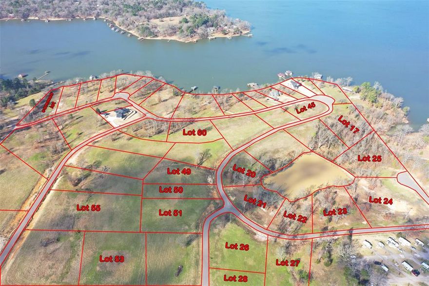 Discover the perfect place to build your lake getaway in SouthShores, a beautiful new gated subdivision on the shores of Lake Bob Sandlin. Just a couple of hours from the DFW metroplex, this up-and-coming community offers the peace of lake living with the convenience of nearby access.
Enjoy exclusive access to a community waterfront lot featuring a fishing dock, perfect for relaxing weekends and making memories with friends and family. Whether you're dreaming of a weekend retreat or a full-time lake home, SouthShores provides the ideal setting for your custom build. Secure your lot now and start planning your life at the lake! LOT IS WATERFRONT TO POND.