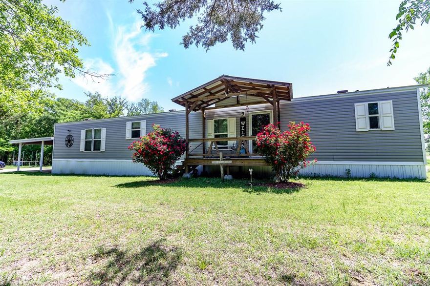 Seize a fantastic opportunity to own approximately 21.74 acres of serene countryside in the coveted Ola community of Kaufman! This idyllic property, currently in agricultural production, boasts two picturesque ponds and a beautifully maintained 2018 singlewide manufactured home. Inside, discover an open and spacious floorplan featuring two bedrooms and two baths, including a master suite with a luxurious soaking tub and separate shower. Imagine unwinding on your private back porch, watching breathtaking sunsets reflect on the tranquil pond. As an added bonus, a second 3-bedroom, 2-bath singlewide (currently not connected to utilities) can be included in the purchase. Don't miss out – schedule your showing appointment today and experience the peace and potential this property offers!