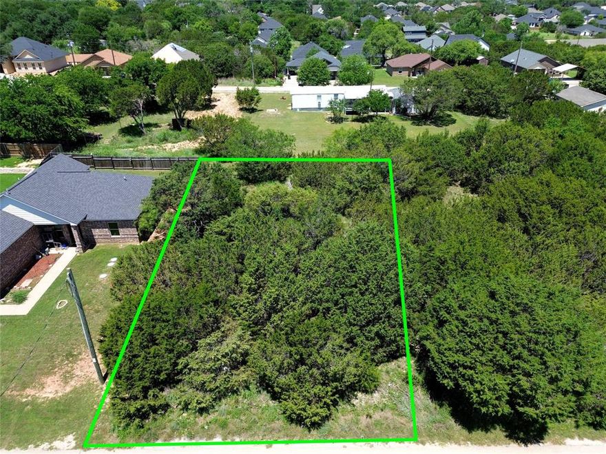 GUARDED & GATED LAKE FRONT COMMUNITY*BUILD YOU DREAM HOME*BRING YOUR OWN BUILDER*NO CITY TAXES*OUTSIDE CITY LIMITS*WATER IS AQUA CO OP*ELECTRIC IS UNITED CO OP*COMMON FEATURES INCLUDE SWIMMING POOL, CLUBHOUSE, TENNIS COURTS, CLUB HOUSE AND BOAT RAMP*SEPTIC NEEDED*NO SURVEY*BUYER TO PAY FOR NEW SURVEY IF NEEDED*