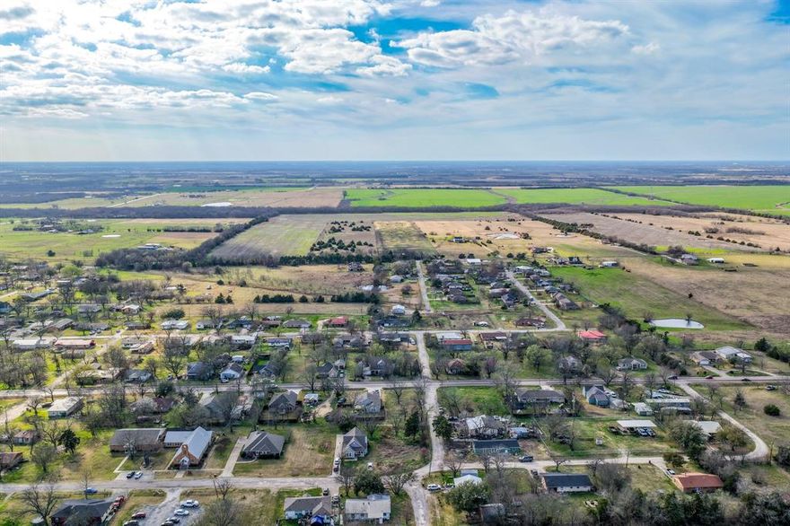 Located in the heart of Celeste, this cleared and level residential lot at 215 N 4th Street offers a great opportunity to build your next home within city limits. Spanning approximately 0.181 acres (7,884 square feet), the property is ready for development with city water and city sewer already available. Situated on a city street in the established Orig Town of Celeste subdivision, the lot is zoned for residential use and ideal for a single-family home. With no HOA and convenient access to local schools in Celeste ISD, this property provides flexibility for builders, investors, or anyone looking to create a custom home in a small-town setting while still being within reach of the greater North Texas area.