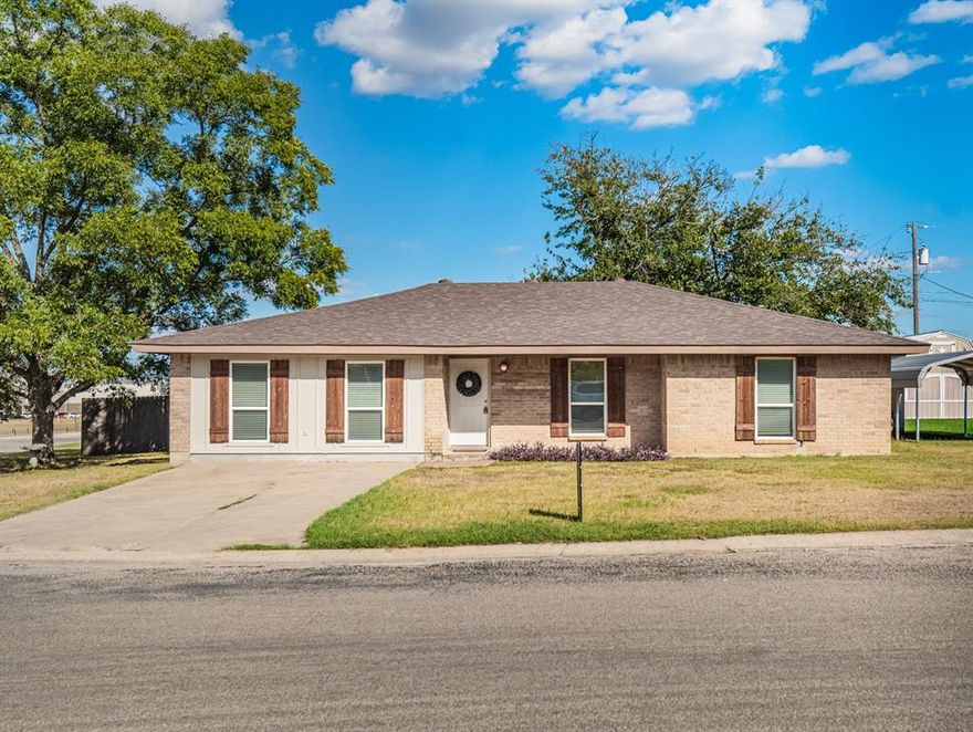 Within walking distance to the Comanche School District, this beautifully updated 1,750 sq. ft. home (built in 1976 and thoughtfully renovated in 2021) offers the perfect blend of character and modern comfort. 
You’ll enjoy the bright, cheerful kitchen that’s full of charm from the cozy breakfast banquette framed by a large, sun-filled window to the generous walk-in pantry, designed to keep countertops clear and organized. 
The home features 3 bedrooms and 2 full bathrooms, including a main suite with a beautifully tiled walk-in shower. Each bedroom boasts ample closet space, giving everyone plenty of room to stay comfortable and clutter-free. 
What makes this home truly special are the two versatile living areas. Whether you dream of a formal dining room, media or game room, homeschool classroom, cozy library, craft studio, or even a second oversized bedroom, the possibilities are endless. 
The sliding glass doors invite you to extend your living space outdoors, where you’ll find shade-filled afternoons on the covered patio and two additional concrete pads perfect for grilling, outdoor dining, and entertaining under the Texas sky.
Practicality hasn’t been overlooked: the utility room easily accommodates a full-size washer and dryer with space to spare for a freezer or second refrigerator.
Nestled in the sought-after Liberty Acres neighborhood, you’ll love the wide paved streets, curbs, and flexible parking options whether up front on the concrete pad or in the back with gated rock-pad access.
Don’t miss the chance to make this versatile and welcoming home your own! Schedule a showing today!