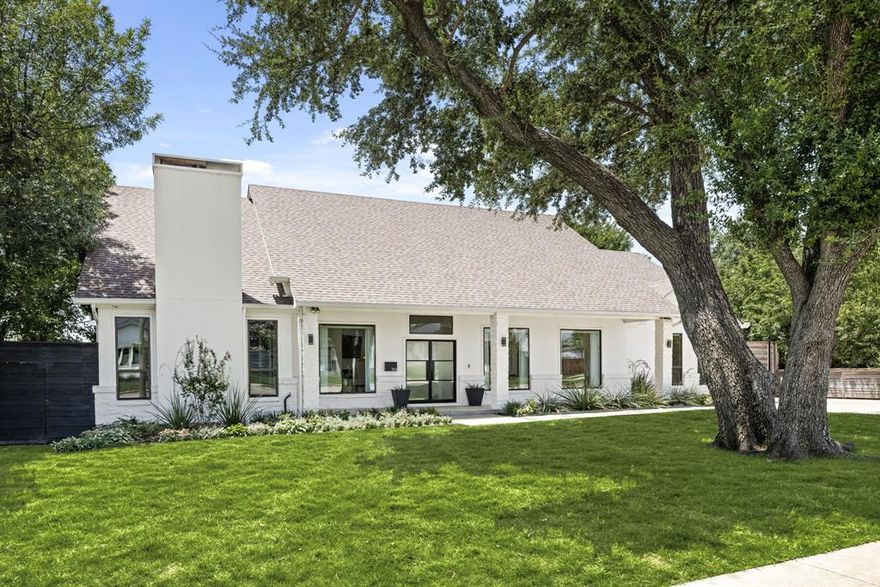 Set in the heart of Preston Hollow’s coveted private school corridor, this stunning one-story ranch has been taken to the studs and meticulously reimagined for modern living. A masterclass in design and comfort, the home offers a seamless blend of sophisticated interiors and resort-style outdoor amenities. Award-winning landscape architect Jason Osterberger transformed the expansive backyard into a private retreat, complete with a spacious covered patio with automated screens, a state-of-the-art outdoor kitchen, gorgeous pool and spa, a putting green, and mature trees that provide both beauty and shade. Inside, the home boasts tall ceilings, an open-concept layout, and exceptional natural light. Oversized bedrooms all include en-suite baths and generous closet space. The luxurious primary suite is a true sanctuary, featuring large picture windows with views of the pool, a sitting area, and a spa-inspired bath completely renovated in 2024 with a steam shower, dual vanities, designer lighting, and an impressive walk-in closet with extensive storage. Additional highlights include a dedicated office, a media room, and thoughtfully designed spaces that flow effortlessly from room to room, indoors to out, making this home an entertainer’s dream.