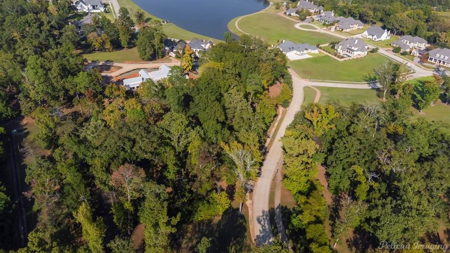 Beautiful 2.3 acre lot in one of Esplanade's prime locations!!  This lot is located near the
pond and is one of the largest lots available in the neighborhood.  This exclusive neighborhood
has rolling hills, a private gate that as an entrance from Flournoy Lucas.  The neighborhood
is conveniently located to 3132 and I-49, restaurants, hospitals and shopping.  Build your
dream home!!

2.306 ACS. M-L - LOT 11, ESPLANADE UNIT 2, RAILSBACK DISTRICT, 161309-27-11