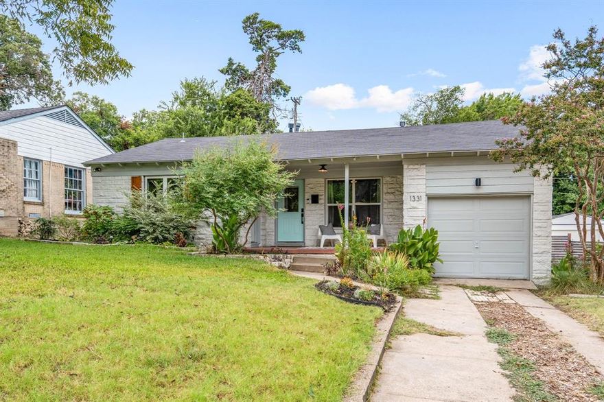 Welcome home to the cutest bungalow near Beckley Club, where the hills roll and the peacocks roam freely! This 3 bedroom, 2 bathroom gem has been carefully maintained and creatively re-imagined -- with fabulous updates in the kitchen and bathrooms and fresh paint, re-stained floors, and new windows throughout. The outdoor space is equally as special, with a plethora of perennials planted in front (full list to be provided) and a large wraparound deck in the back, with plenty of yard space remaining. The kitchen's details are unique and practical, with concrete countertops, open shelving, stainless steel appliances, a large walk-in pantry, loads of natural light, and direct access to the back patio (complete with a canopy and twinkle lights!). The primary suite is both roomy and private, with custom wood paneling and shiplap, and a walk-in shower and a double vanity. Both guest rooms have beadboard wainscoting and plenty of storage, with a cute full bathroom between them. Single car garage is attached, with access through the kitchen. Located less than 5 minutes from the Dallas Zoo, Herndon Park, and the 5-acre Halperin Park, which is scheduled to open early 2026. Full list of updates provided upon request. Make this special home your own!