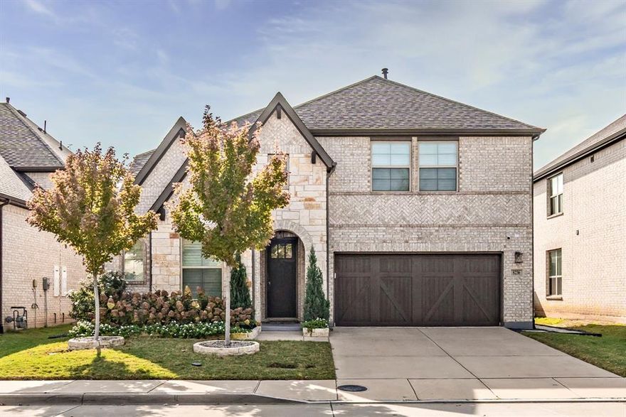 Situated in the highly desirable University Place community, this beautifully appointed 4-bedroom, 3-bath residence offers 3,083 square feet of refined yet comfortable living. Designer details immediately set the tone, from statement wallpaper in the dining room to a custom crystal quartzite topped buffet featuring bar cabinetry and a built-in wine fridge — an entertainer’s dream. The open-concept kitchen is light and airy, seamlessly connecting to the expansive living room with a cozy fireplace and adjoining breakfast area. Swoon worthy light fixtures throughout the home add warmth and character at every turn and set this home apart from the rest. The main-level primary suite provides a private retreat with a spa-inspired bath, oversized walk-in shower, and generous walk-in closet space. Just off the entry, a versatile guest suite with a custom Murphy bed easily transitions between office and overnight accommodations. Upstairs, a spacious media room offers endless possibilities for movie nights or play space, complemented by a large landing ideal for a study or secondary workspace. Two additional bedrooms share a well-appointed Jack-and-Jill bath. The epoxied two-car garage adds polished functionality, while the beautifully landscaped backyard creates a true outdoor escape with a covered living area and ample room to entertain or unwind. Built in 2019 by Beazer Homes, residents of this community can enjoy access to resort-style amenities including a pool, amenity center, playground, dog park, and more — all within one of the area’s most sought-after communities and zoned to exemplary Canyon Creek Elementary.