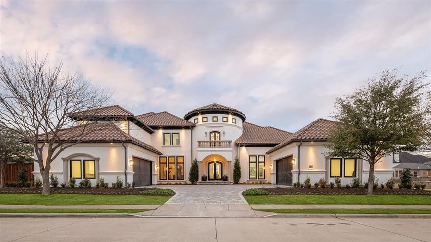 This exceptional home combines classic Mediterranean architecture with lux transitional design.  Set on a waterfront lot in desirable gated community, this beautifully remodeled home showcases an open living concept & fabulous kitchen equipped with top-of-the-line appliances & spacious island designed with entertaining in mind. The owner’s suite is the perfect retreat with luxurious spa-like bath & direct access to backyard and water views. Sophisticated office with fireplace & serene water vistas. Beautifully appointed downstairs guest bedroom with private bath. Second floor features an expansive gameroom, media room & 4 large bedrooms each with ensuite baths. Unparalleled outdoor living space including 2 expansive terraces with water views, outdoor kitchen, swim-up pool bar and spa. First class location close to The Star, fine dining, retail and Tollway.