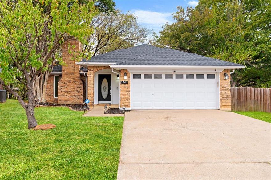 Charming one-story home in a highly sought-after Sterling Green with no HOA! This beautifully maintained 3-bedroom, 2-bath property sits on a quiet, peaceful street and features a desirable semi-open concept layout with wood-like tile flooring and abundant natural light throughout. The kitchen offers stainless steel appliances and flows effortlessly into the living and dining areas—perfect for everyday living and entertaining.
The inviting primary suite includes French doors that open directly onto a stunning rustic-stained wooden deck. Relax outdoors while overlooking a serene greenbelt and creek, creating a private retreat right in your backyard.
Conveniently located near top attractions including the Dallas Cowboys Stadium, Rangers Ballpark, premier dining, shopping, entertainment, and much more. This home blends comfort, style, and an unbeatable location—don’t miss this incredible opportunity!