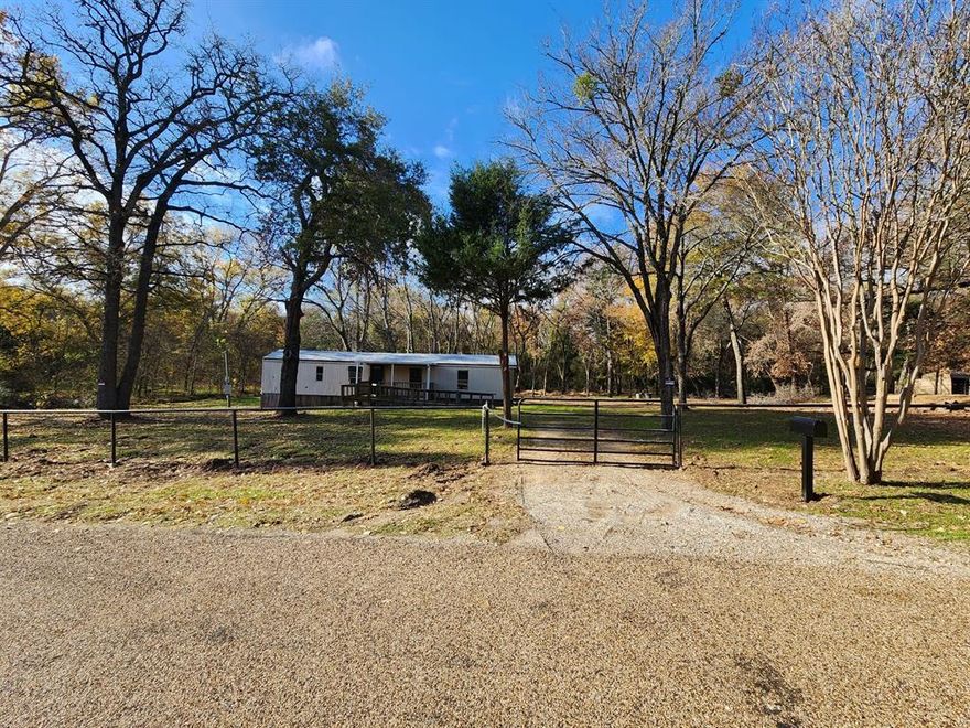 Excellent opportunity to purchase over an acre of property in Kaufman for a great price! This charming mobile home is nestled in a beautiful serene landscape and is in need of some TLC, bring your ideas and restore this gem or buy for land value & build your dream home! Being Sold As-Is, no repairs will be made. Survey Available, don’t delay come tour this one today!