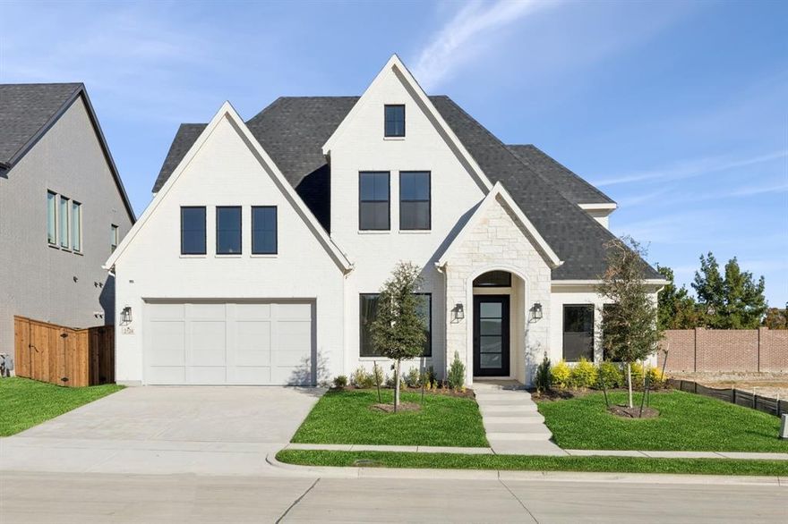SOUTHGATE HOMES STELLA floor plan.  Experience the perfect blend of classic and contemporary in this stunning white-painted brick home. Step inside to soaring 20’ ceilings and an open-concept layout designed for seamless living and entertaining. A 15’ sliding glass door connects the expansive family room to the covered back patio, creating effortless indoor-outdoor flow.  The chef-inspired kitchen is both functional and elegant, featuring a 36 inch gas apron-front rangetop, double ovens, and a spacious island ideal for gathering. Rich hardwood floors extend throughout the main living spaces, adding warmth and sophistication.  Retreat to the owner’s suite, where a walk-through shower, freestanding soaking tub, and generous dual vanities create a true spa-like escape.  Upstairs, the game room, media room, and wet bar offer the ultimate setup for movie nights and celebrations.  MOVE IN READY NOW!