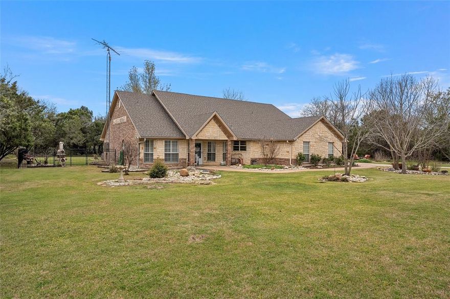 Rare find in White Bluff Resort on Lake Whitney! Enjoy 2.76 secluded acres surrounded nature and peaceful creeks. This charming home offers spacious living with a large, beamed great room featuring a floor to ceiling stone woodburning fireplace. Home highlights include custom Southwestern style wall finishes, plantation shutters, a formal dining area, and an energy efficient geothermal system. The property also features a new detached workshop garage (2022) with a full-height attic, a 2025 roof, 2023 exterior paint, new fencing (2021), and a repainted garage (2023). Horses are permitted, and the home’s landscaped outdoor spaces invite quiet relaxation or entertaining. 

Located within the private, gated White Bluff Resort, home to 3,450 acres of amenities including two 18 hole golf courses, pools, tennis courts, a marina, and dining. Ownership includes 72 rounds of golf per year that may be used, gifted, or exchanged for a fitness membership. Discover the perfect blend of nature, comfort, and resort living on Lake Whitney. All Disclosures, survey, property details, and HOA information are available.