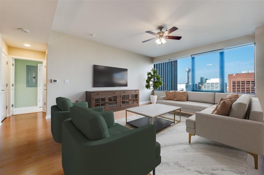 This downtown Dallas two bedroom, two bath condo features an open floor plan with stunning west facing, city views of Reunion Tower, the Bank of America Building, and picturesque sunsets. The kitchen is equipped with a NEW stainless steel stove, dishwasher, and microwave...it also features granite countertops and significant cabinet storage. The large primary bedroom includes a well designed walk-in closet. The bathrooms offer large vanities with large designer mirrors and lighting...and new toilets.  The primary bath features a large soaking tub.  The Refrigerator and full-sized Washer & Dryer are included. This unit comes with the rare and highly coveted TWO seperate parking spaces, not tandem! If you only need one space, you can sell (or rent) your extra space...parking spaces have previously sold for $20,000.

Enjoy building amenities like a fitness center, resort-style pool, business center, and 24-hour concierge. Secure parking and controlled access ensure peace of mind. Located just steps from top dining, shopping, and entertainment, this condo offers convenience and luxury.