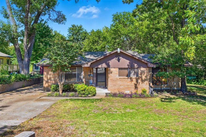 An Exceptional Opportunity and Value in Grapevine’s Historic District. Perfectly positioned just two blocks from iconic Main Street, this Historic District residence offers a rare blend of timeless character, privacy, and future potential. Nestled on a highly sought-after private creek lot, this property presents a truly distinctive opportunity within one of Grapevine’s most prestigious and beloved neighborhoods. Designed for both immediate comfort and long-term vision, the home invites you to enjoy its charm today while offering ample space to thoughtfully expand or curate a personalized renovation. Mornings begin on the serene screened-in porch, where tranquil creek views, mature trees, and birdsong create a peaceful retreat from the everyday.Step beyond your doorstep and immerse yourself in the vibrant lifestyle that defines Grapevine living—award-winning wineries, chef-driven dining, boutique shopping, and celebrated seasonal festivals are all just a leisurely stroll away. A property offering this level of location, setting, and possibility is a rare find in the Historic District.