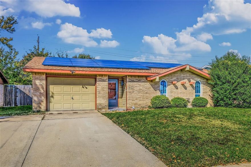 Welcome to this charming single-story home featuring key updates and an oversized backyard perfect for relaxing and entertaining. The home includes updated windows, a newer HVAC system, and solar panels that will be fully paid off at closing for long-term energy savings.

Inside, the layout offers a spacious living area with natural light, a corner fireplace, and sliding doors to the backyard. Archways connect the kitchen and dining area, and both bathrooms feature tile surrounds with functional designs. The primary suite is set apart for added privacy.

Outside, the expansive covered patio and large backyard provide plenty of room for gatherings, play, or outdoor projects. Located in a quiet neighborhood with no HOA, no MUD, and no PID, this home offers comfort and flexibility.

Home is sold as-is, and sellers are motivated. A great opportunity in an established community with valuable updates already in place.