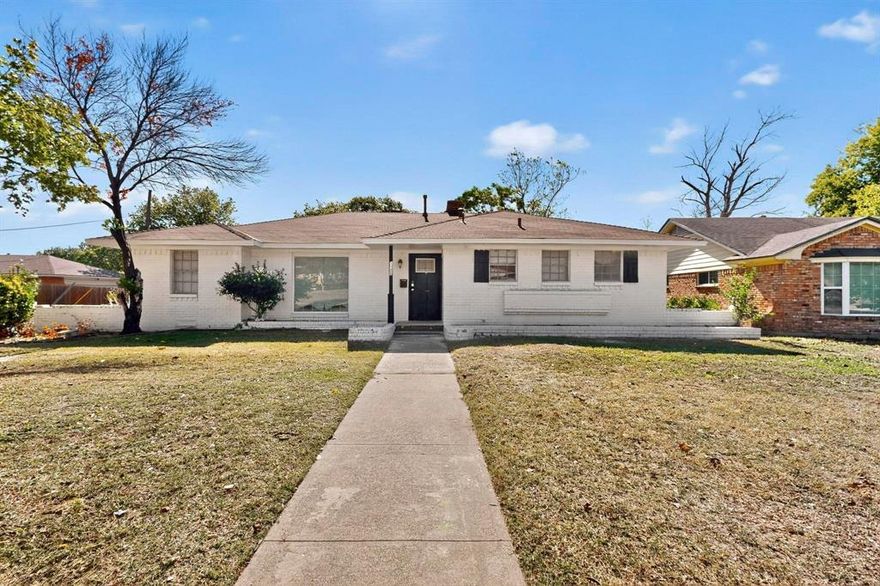 This beautifully updated home blends modern comfort with timeless charm. Step inside to find recent finishes thoughtfully selected for both style and function, creating a warm & welcoming space throughout. The open layout flows naturally into a spacious kitchen & dual living areas anchored by a brick fireplace & charming built-ins, perfect for hosting gatherings or quiet evenings at home. Out back, enjoy a huge yard with endless possibilities for entertaining, gardening or simply relaxing in your own private space. Located in a highly convenient area, this home offers quick access to Downtown Dallas & major highways including I-20 & I-30, putting the entire Metroplex within easy reach. With a rare combination of tasteful updates & generous outdoor space in an unbeatable location, this one checks all the boxes!