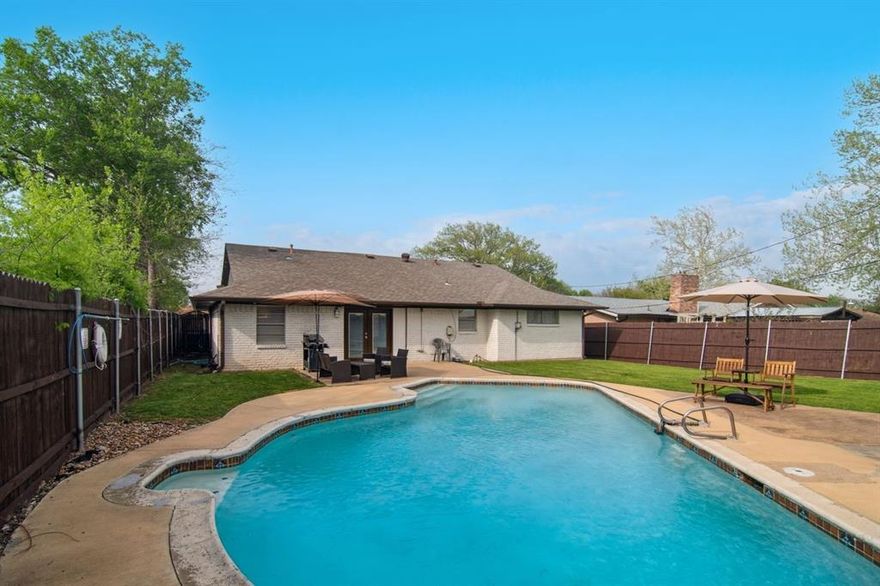 This adorable home was nicely remodeled in 2019 with beautiful, engineered wood floors, modern lighting and ceiling fans, as well as an updated kitchen.  Chefs will enjoy the granite counters, double sink, faucet, Whirlpool double element cook top with a warm zone, vent, self-cleaning oven and a SS dishwasher.  Cabinets are plentiful with nice hardware and there is a pantry for extra storage. The Samsung refrigerator may remain upon request. Other improvements included a gas line installed to the dryer, roof replaced in 2019, water heater replaced in 2020, HVAC, gutters and cooktop replaced in 2023. The updated bathrooms offer modern sinks, hardware, vanities, tile, toilets, lighting etc. The primary bath features a nice walk-in shower. Good storage with two linen closets, coat closet and extra front storage space in the garage.  Of course, the inviting backyard pool may be a primary reason for selecting this home. It too has been well maintained with a new filter in 2022 and a pump in 2025. The pool equipment is in a shed to help protect during inclement weather. The yard has a wood fence with steel posts and there is plenty of grass area for pets and kids to play.