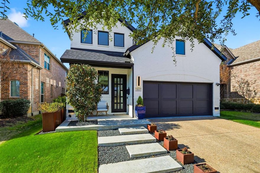 Fully renovated and impeccably maintained, this refined residence in the heart of Castle Hills offers a thoughtfully designed floor plan and elevated finishes throughout. A freshly painted exterior and manicured landscaping lead into a light-filled two-story entry, setting the tone for the home’s sophisticated style. The dining area and designer kitchen flow seamlessly into the living space, filled with natural light and clean architectural lines.

The chef’s kitchen features white Krion waterfall countertops and backsplash by Porcelanosa, custom cabinetry, Horizon tile flooring, custom Hunter Douglas electric shades, Café stainless steel appliances, and a Kraus sink. The living area is anchored by a striking Porcelanosa-framed feature wall with white marble and black stone, showcasing a decorative fireplace and a custom pull-out television system for discreet equipment storage. Solid iron glass doors open to a private outdoor retreat with a padded seating area and a beautifully turfed backyard.

The first-floor primary suite provides a serene retreat with an ensuite bath and custom walk-in closet. Upstairs, a second living area is joined by additional bedrooms and a flexible space ideal for a home office or optional fourth bedroom. The two-car garage features a single garage door, epoxy flooring, and two EV charging outlets.

With 2,886 square feet of curated living space, a fenced yard, and covered rear porch, this home is located in Lewisville’s sought-after Castle Hills community, offering resort-style pools, parks, trails, and community events, all just minutes from Sam Rayburn Tollway, shopping, and dining.