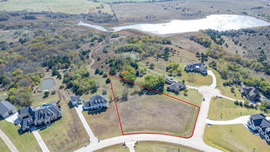Beautiful 1.5-acre corner lot in the prestigious High Point Lake Estates community. Nestled on a quiet cul-de-sac, this land offers peaceful country living with convenient access to Rockwall and the DFW metro area. The lot features gentle terrain, mature surroundings, and ample space to build your custom dream home. Enjoy the privacy, scenic lakes, and upscale atmosphere this neighborhood is known for—utilities are in place and ready for construction.