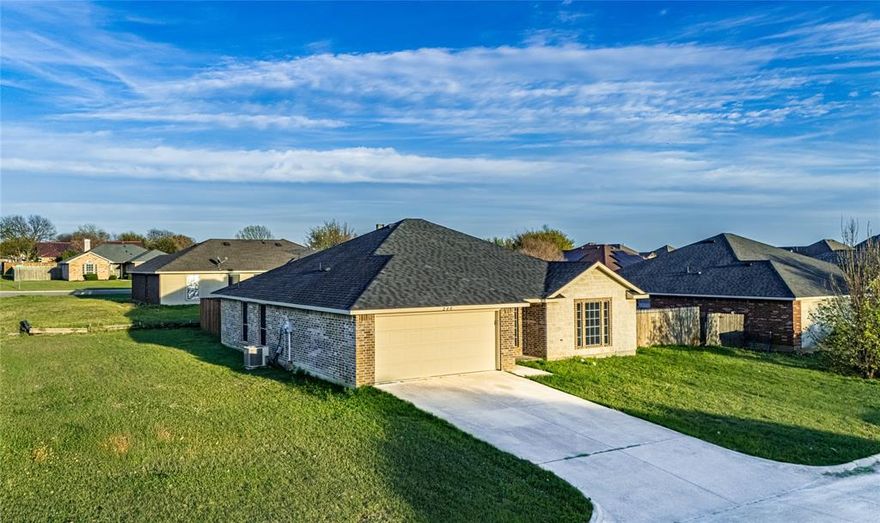 Step into modern luxury in the established Indian Trails subdivision, where this fully updated 4-bedroom, 2-bath home sits on a spacious CORNER LOT and offers a true new-home feel without the new-construction price. Reimagined in 2026, updates include fresh interior and exterior paint, a brand-new roof, and a new garage door, with major system upgrades already completed, including a new HVAC system and hot water heater installed in 2023. Durable wood-look luxury plank vinyl and custom tile create a completely carpet-free interior. The kitchen features custom cabinets with soft-close doors, new stainless steel appliances and premium countertops, while the private primary suite provides a relaxing retreat with a jetted garden tub, separate shower, dual sinks, and two walk-in closets. Conveniently located minutes from Hwy 67 and I-35, this move-in-ready home combines modern updates, newer systems, and exceptional value on a large established lot. Walking distance to the Elementary and Junior High schools.  Book your showing now!