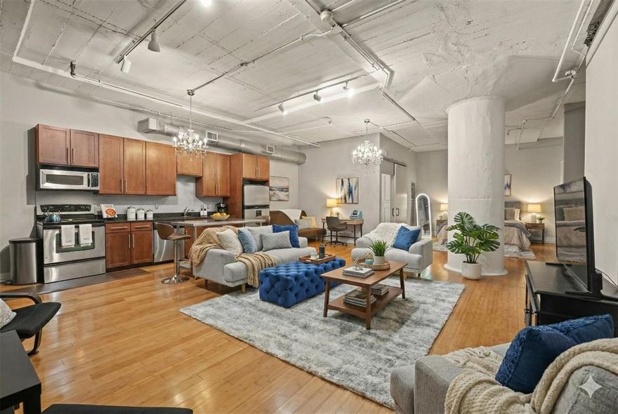 Welcome to this sophisticated 1-bedroom, 1-bathroom condo at The SoCo Urban Lofts, a highly sought-after Downtown Dallas address. This spacious residence features an open-concept layout with hardwood floors and elegant chandelier lighting. The kitchen boasts stainless steel appliances, granite countertops, and a central island. The spa-inspired bathroom offers an oversized tub-shower combo and sleek dark tile. Enjoy elite amenities including a rooftop pool with grilling area, media room, state-of-the-art fitness center, personal storage, in-building laundry, and 24-7 security with concierge. One of Downtown's most competitive HOA fees covers water, trash, sewer, insurance, parking, and internet. Perfectly located, this condo is within walking distance of the AT&T Discovery District, biking-walking trails, the Farmers Market, Neiman Marcus, and diverse dining and entertainment. Experience a rare urban sanctuary blending low-maintenance luxury with exciting city living. Schedule your visit today!