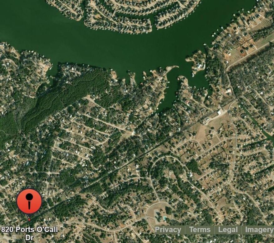 Great investment home on 3 lots in a lake community 5 minutes from boat ramp. Seller has a survey. Latest updates in 2025, including flooring which was updated to vinyl planks. The new roof was also replaced with metal. Great vacation home for the lake life or ready to rent out immediately with seller willing to convey the following list of items: Washer and dryer, as well as some of the added cabinetry in the laundry area and in the master bath; inside fridge; outdoor freezer, which has a warranty & back-up solar power; home security equipment; wooden hutch against kitchen wall; outdoor gas grill. Plenty of room to park a boat or RV with complete hook-up, 50-amp plug-in & septic.  Kitchen has a breakfast bar, all new stainless-steel appliances, new large sink & new faucet.  New low-E Energy Star, lifetime warranty windows, keep it cool in the summer. Master bath completely remodeled in 2024, with a walk-in shower, granite vanity top, new sink & new fixtures; extra shower wall tiles are in the 24x14 storage bldg, powered by solar energy. Guest bath received a new vanity, new sink & new faucet last yr. Front parking is newly paved, as well as the driveway at the back of the property. There are 2 parking entrances to this home. There is an extra-long 24x12 ft carport for a big truck or trailer. There are so many extras. Front decking was extended to 18x10 ft with additional decking at the back as well. The storm shelter is clean and in good condition. The home & grounds have been very well maintained. The HOA has 2 boat ramp locations, 2 playground locations & 2 picnic area locations.