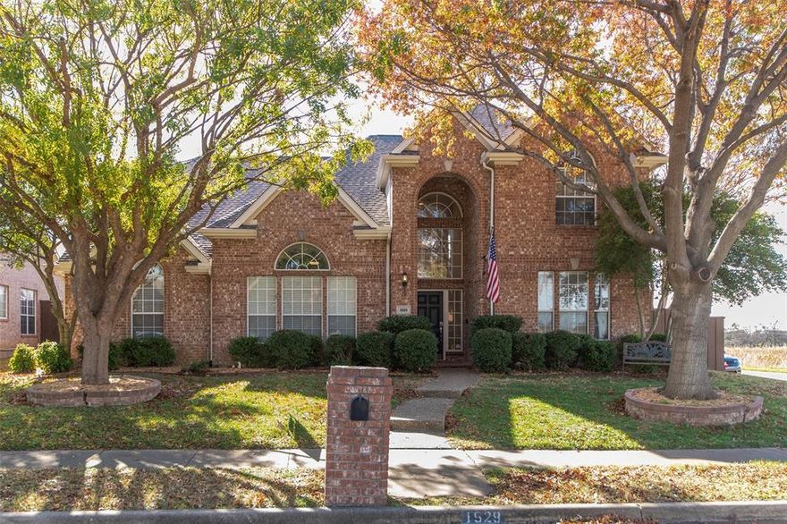 Beautiful 2-story, original owner Carrollton home on a corner lot! Enter to find formal living and dining. Updated kitchen features white cabinets, stainless appliances, gas cooktop, granite counters, center island and refrigerator included. Kitchen opens to family room with hardwood floors, gas fireplace and vaulted ceilings. The primary bedroom suite has updated bath with granite counter vanities, subway tile frameless shower and jetted tub. Downstairs also has a secondary bedroom and full hall bath that is perfect for use as an office or guest room. Upstairs features spacious game room, an expanded bedroom suite with Jack & Jill bath shared with a 4th bedroom. Enjoy the pool, storage shed & oversize garage.