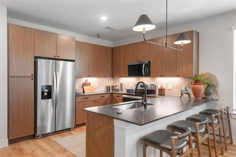 Photo of 701 E Main Street #22107, Lewisville, TX 75057 (MLS # 21421963)