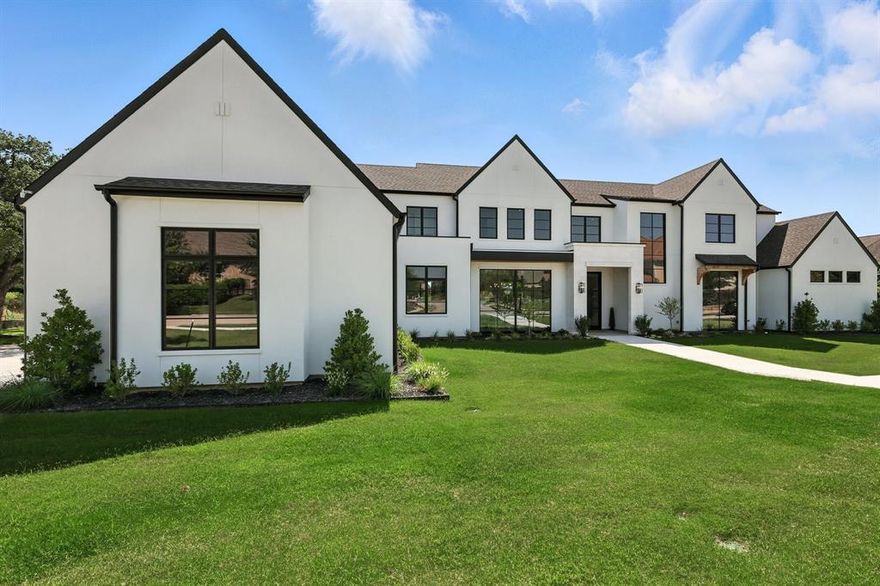 Unbelievable Opportunity to make this Brand New, Calais Custom home your own. Why build when you can buy new!!! Nestled in this quiet, tranquil & prestigious subdivision, enjoy private ponds and peaceful walking paths. This Modern design Masterpiece offers an unparalleled living experience, an Exceptional Floor Plan, gorgeous Natural Light & highest end Designer finishes. The HUGE BACKYARD is Private and is just waiting for you to create your backyard dream oasis in time for Summer!!! (Pool rendering suggests what you could create). Enter this amazing home through a steel & glass pivot front door to a 21 foot soaring ceiling, walls of windows bringing the outside in, open plan living & stunning wood floors throughout. Blending luxurious finishes with modern design, this custom home is complete with Wolf & Subzero appliances, stone countertops, and designer hardware & plumbing fixtures. The open-concept offers a large Family-Breakfast-Chef's Kitchen with huge island and quartzite counters for family and friends to enjoy. The Downstairs Game Room features a Wet Bar and offer access from sliding doors to the oversized backyard and covered patio to enjoy serene views. The dream Primary Retreat boasts a lovely backyard view, a lavish over-sized Spa Bath and HUGE Master Closet. 2nd Primary suite is also downstairs and is a perfect Mother-In-Law suite. Upstairs you find 3 large Bedrooms with modern en-suite baths & spacious walk-in closets, plus a Exercise Room, Loft + Bonus space + storage closet. Add in a private Executive Study w pocket doors, Prep Kitchen + large Walk-In Pantry, spacious Laundry, tons of Storage + spacious 4 car garage provides everything you could need. The East Facing Backyard is PRIVATE & has a large covered veranda complete with fireplace for cozy nights and built in Grill, all surrounded by beautiful topography, Mature Trees + tons of space for all to enjoy. This extraordinary find is a rare combination of privacy, elegance, and functionality!